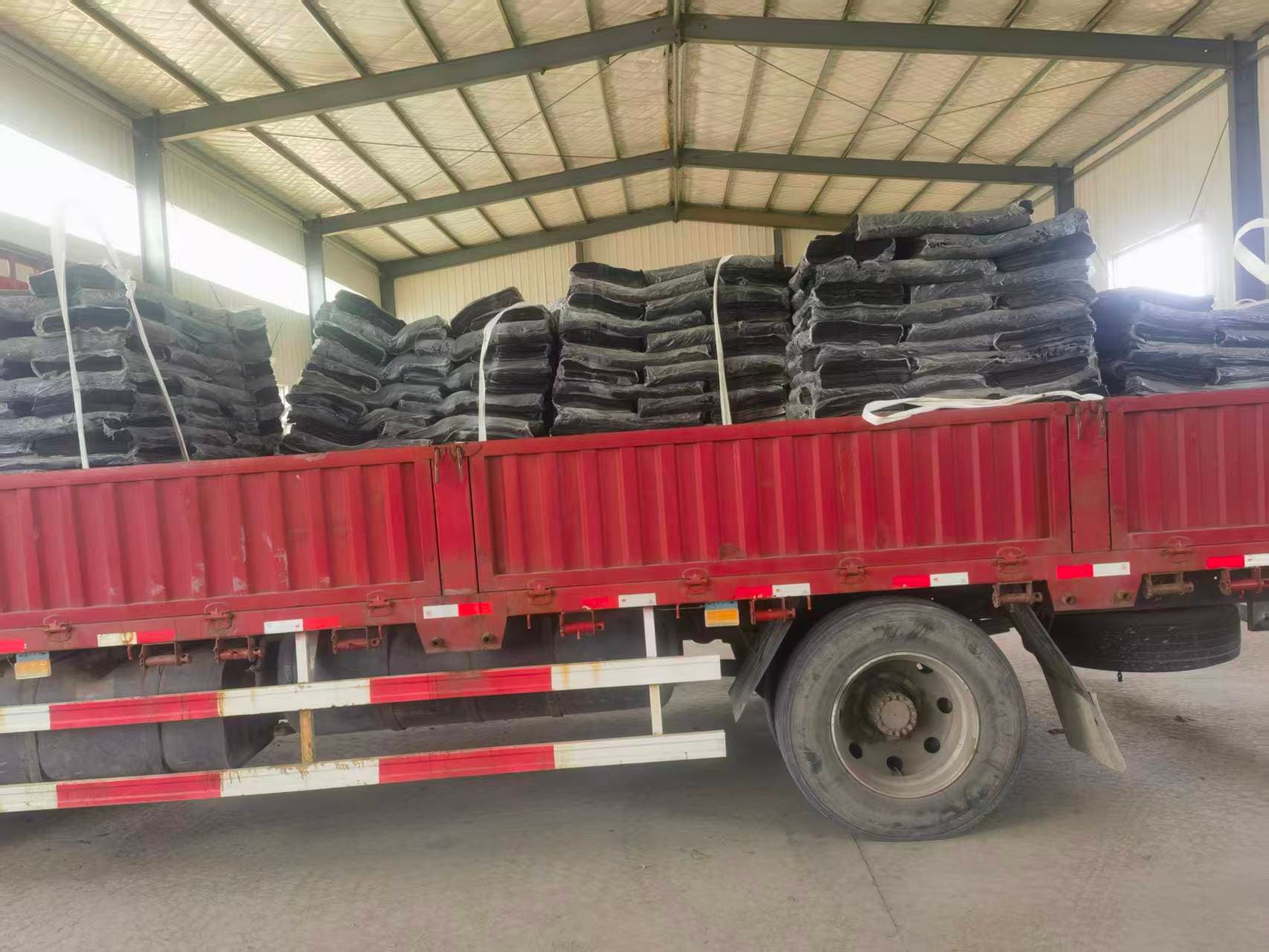Reclaimed rubber sheets loaded for dispatch